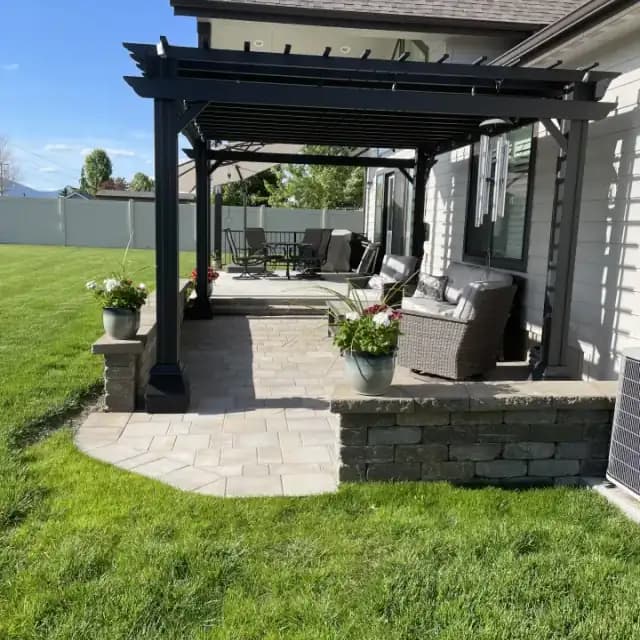 Finished paver patio and pergola by CLR Landscape